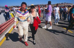 Mario Andretti Walks With His Wife Dee Ann 1980 Motoracing Photo