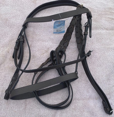 Dark brown cob size flat leather English bridle w/laced reins