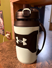 Under Armour 64 oz Black/Teal Reusable Plastic Water Bottle w/ Handle Flip Lock