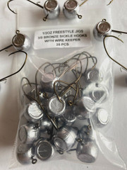 25 Hand made 1/2oz w/ keeper freestyle jig heads with a 3/0 bronze sickle hooks