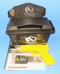 USCCA Welcome Kit Hat With Yellow Plastic Handgun Training Dummy Gun Prop Marked