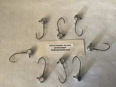 25 Hand made 3/16oz w/ keeper freestyle jig heads with a 1/0 bronze sickle 