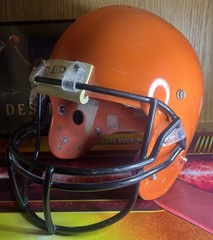 Orange Football Helmet/Black Face mask; Air(1999) No Padding or chinstrap