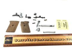 factory Raven model P-25 .25 auto ACP pistol trigger grips release 300288