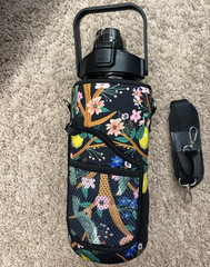 50 oz Plastic Water Bottle Flip Lock w/ Floral Sleeve, Strap & Handle, Black