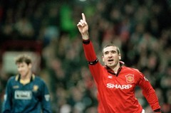 Eric Cantona of Manchester United celebrates after scoring during – Old Photo