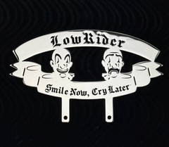 LOWRIDER CUSTOM PLAQUE SMILE NOW/CRY LATER LOWRIDER WORD MIRROR CHROME.