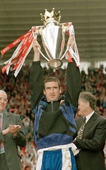 Eric Cantona of Manchester United holding the premiership trophy a- Old Photo