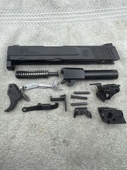 USED OEM SMITH & WESSON M&P SHIELD 9 1.0 SLIDE BARREL LOWER PARTS TRIGGER SAFETY