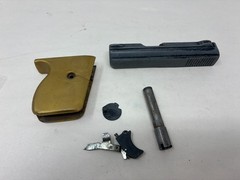 Lorcin Model L25 25Cal. semi automatic parts: slide w/extractor, grip, barrel,